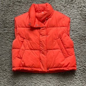 Neon orange puffer vest